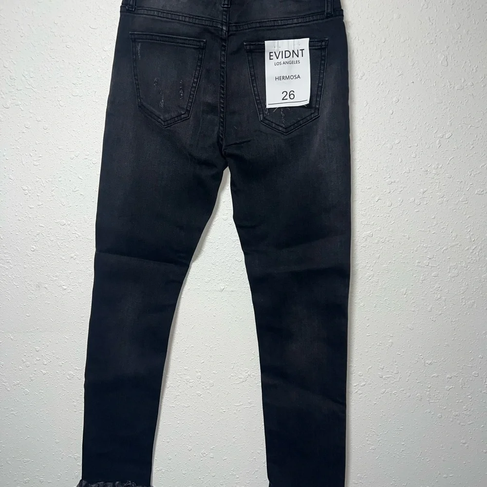 Black Skinny Jeans with Modern Distressed Look - Picture 2 of 5